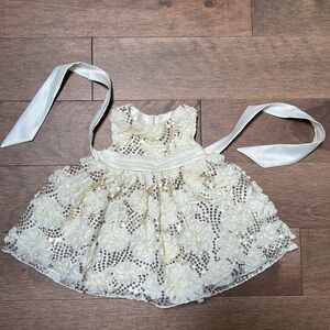 Baby girl dress with flowers and sequins